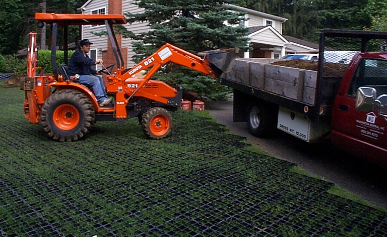 Construction equipment such as tractors, backhoes, and lumberyard delivery flatbed trucks drove on top of the grass for two months.  No damage to the grass or the sod root structure resulted.  Additionally, the use of StabiliGrid prevented stormwater runoff into the neighborhood streets and storm water systems.